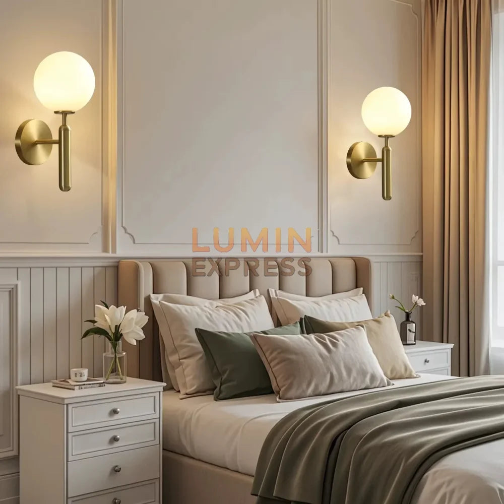 Applique LED ISADORA Gold – luminaire mural doré pour chambre a coucher