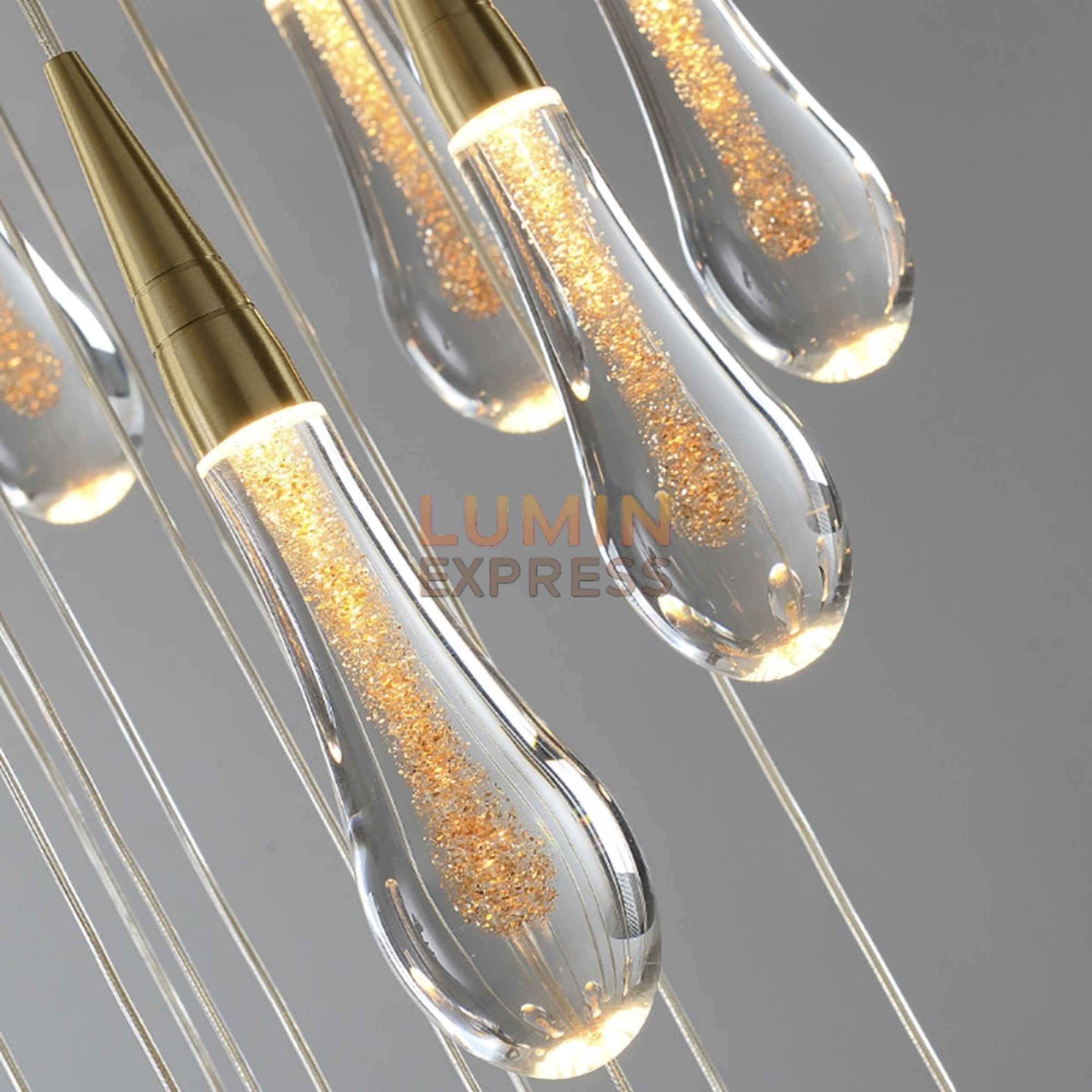 Lustre luxueux en laiton doré avec verre haut de gamme