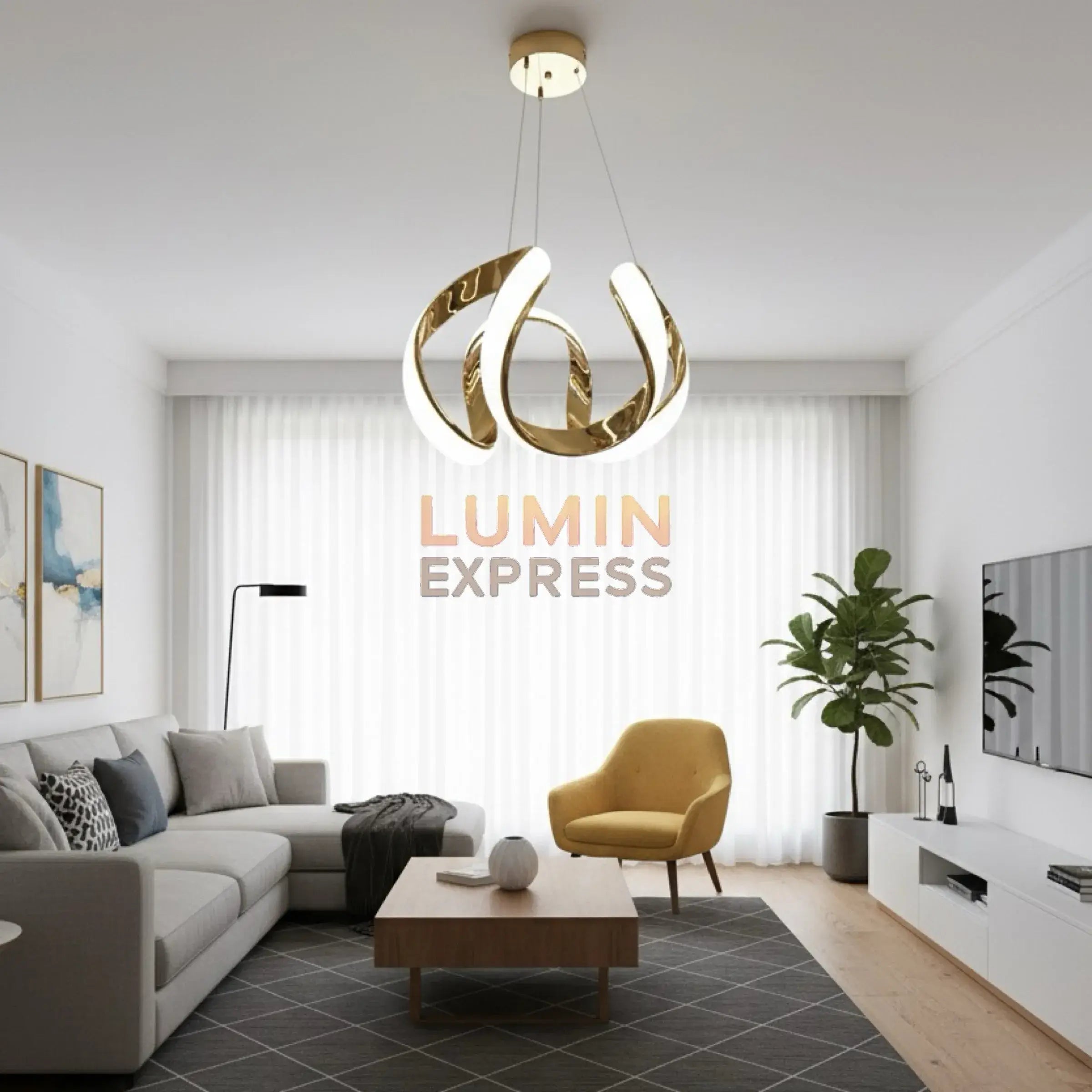 Suspension ARCUS Gold installée au-dessus d’une table à manger