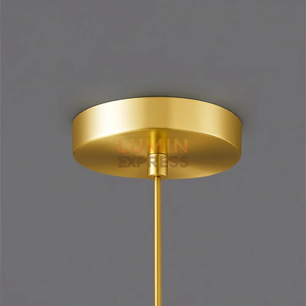 Suspension CUBO ambre en verre soufflé et laiton doré – Luminaire suspendu moderne au Maroc