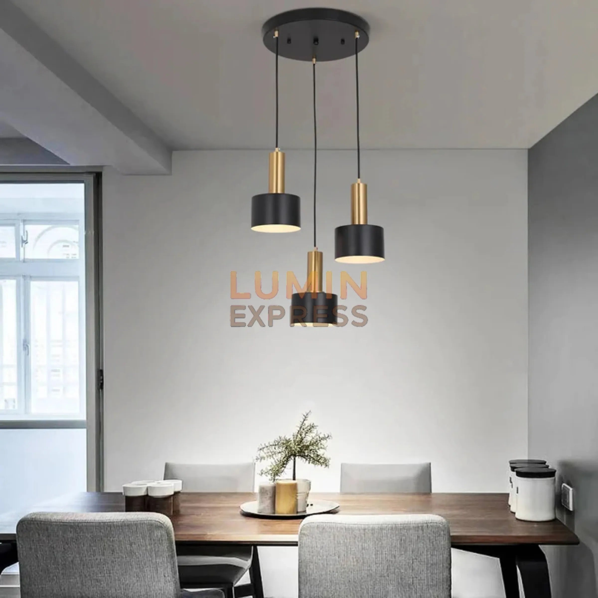 Suspension FLIPO Triple au-dessus d’une table à manger