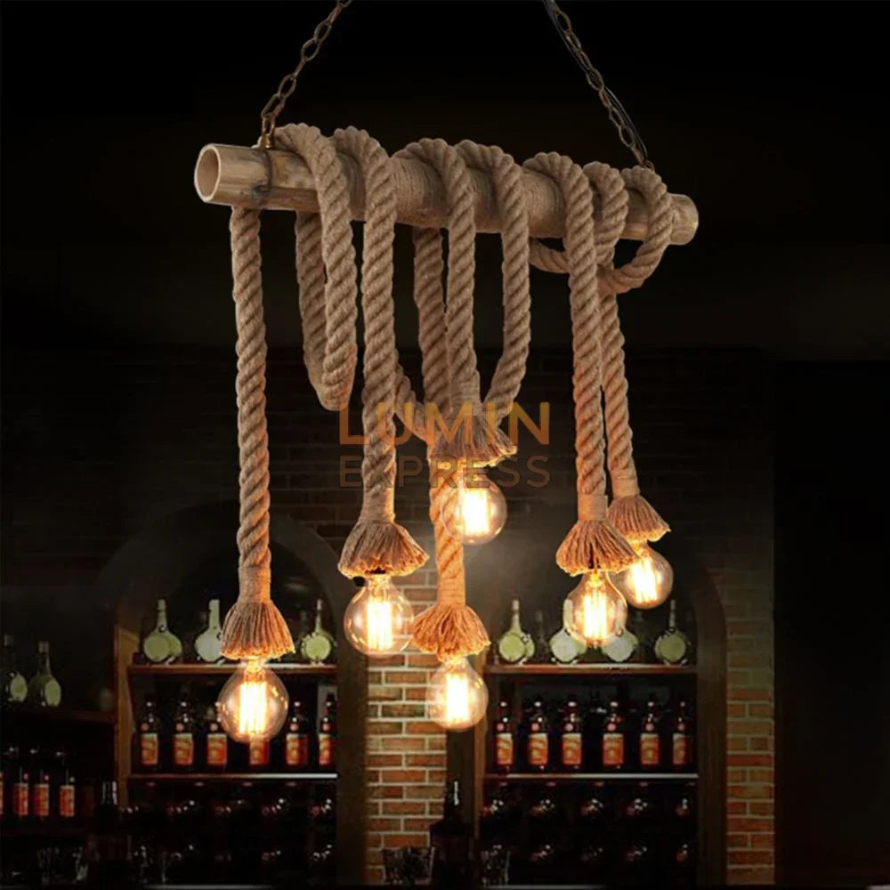 Suspension REYNA en bambou clair lumière douce et naturelle