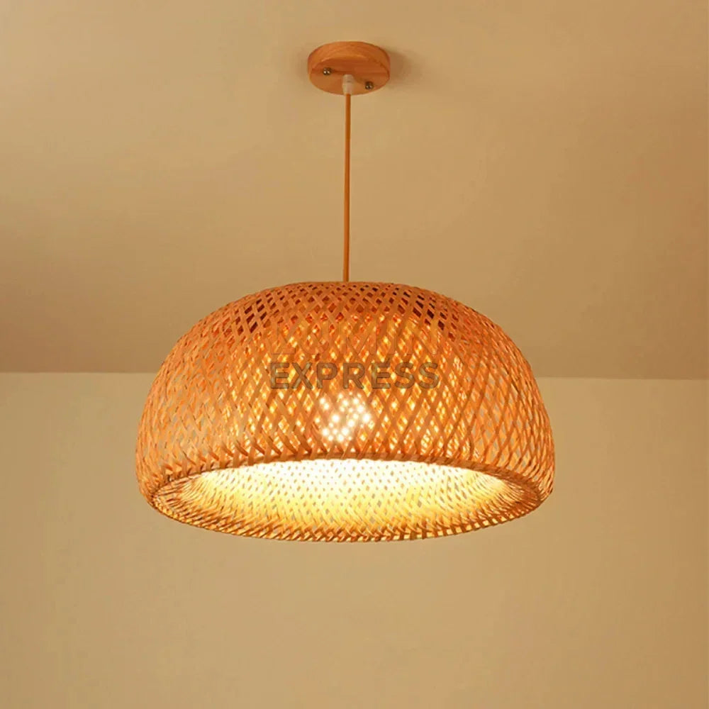 Suspension SUMBA en bambou tressé naturel dans un salon bohème à Essaouira – luminaire naturel et chaleureux signé Luminexpress.