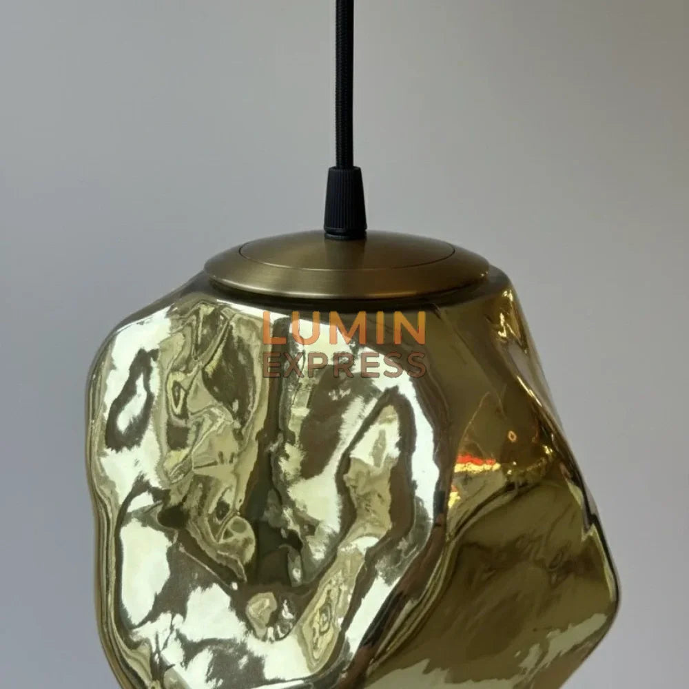 Suspension design triple en verre gold – luminaire doré moderne – LUMINEXPRESS Maroc.