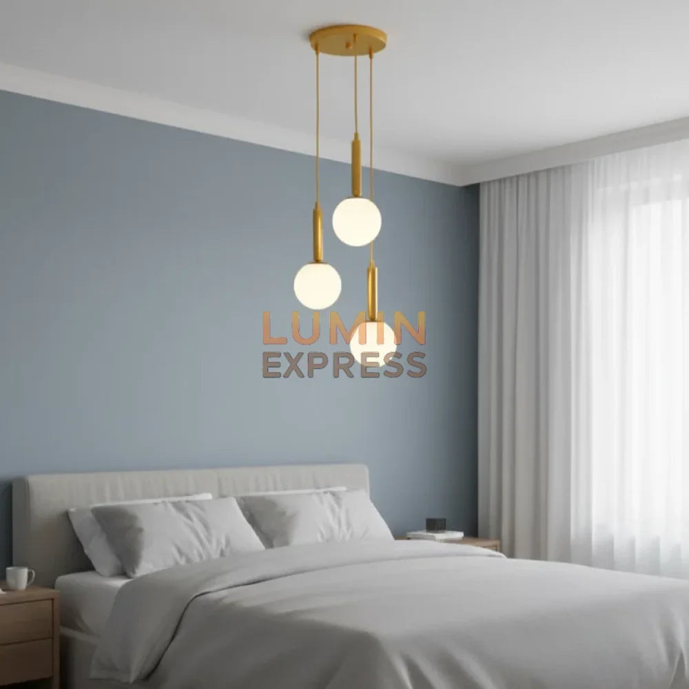 Luminaire design ISADORA Triple Gold pour chambre moderne Maroc