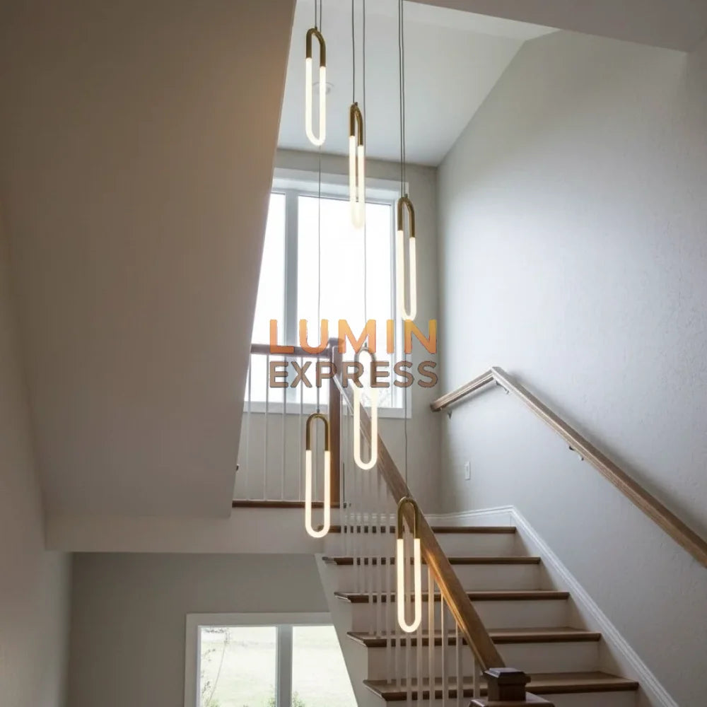 Lustre WARNER Mini Cascade doré pour escalier – design moderne Maroc