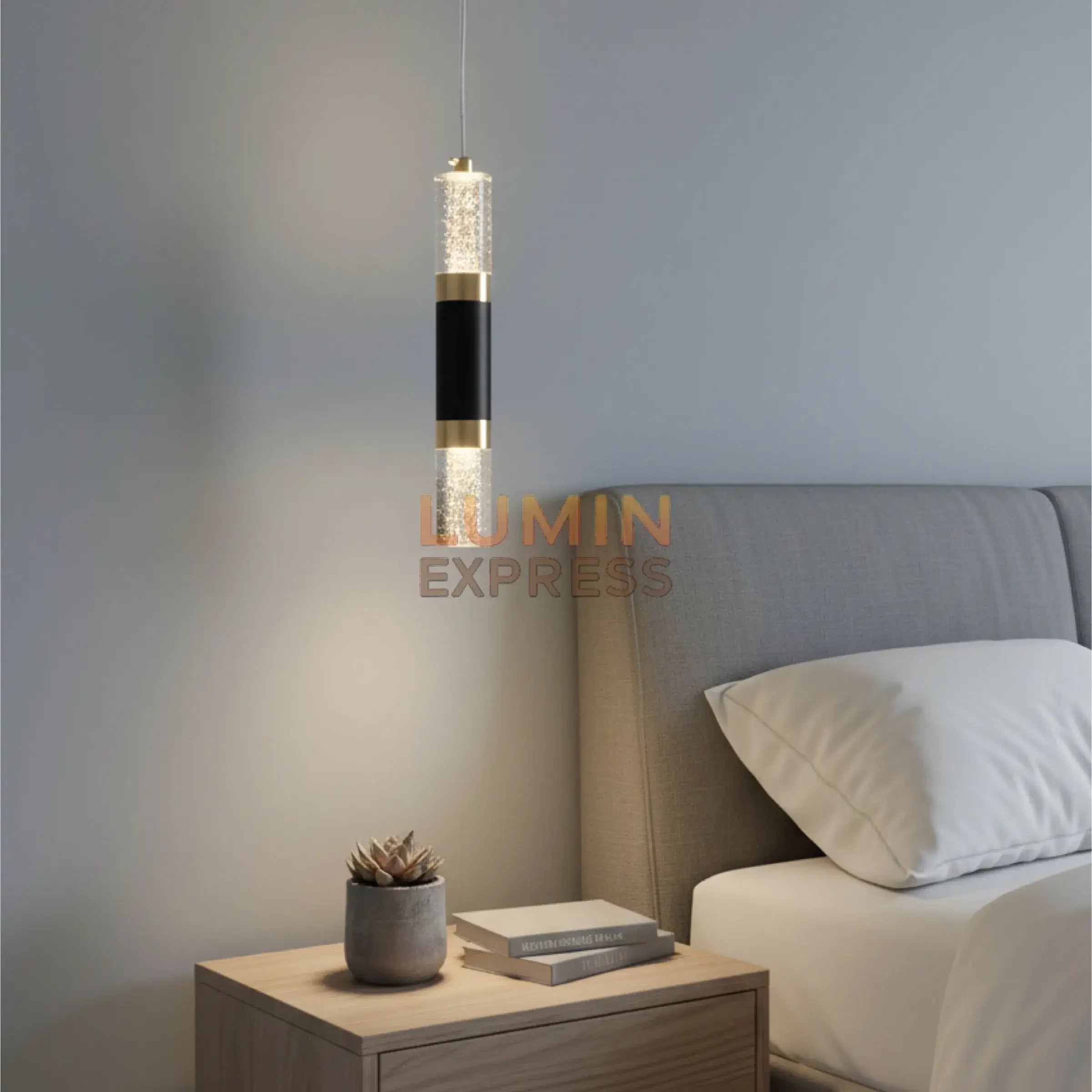 Suspension Luminosa – luminaire design doré pour salon moderne au Maroc.