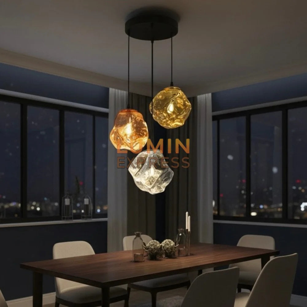 Suspension MELT Triple en verre – coloris rose gold, silver et gold – luminaire design haut de gamme – LUMINEXPRESS Maroc.