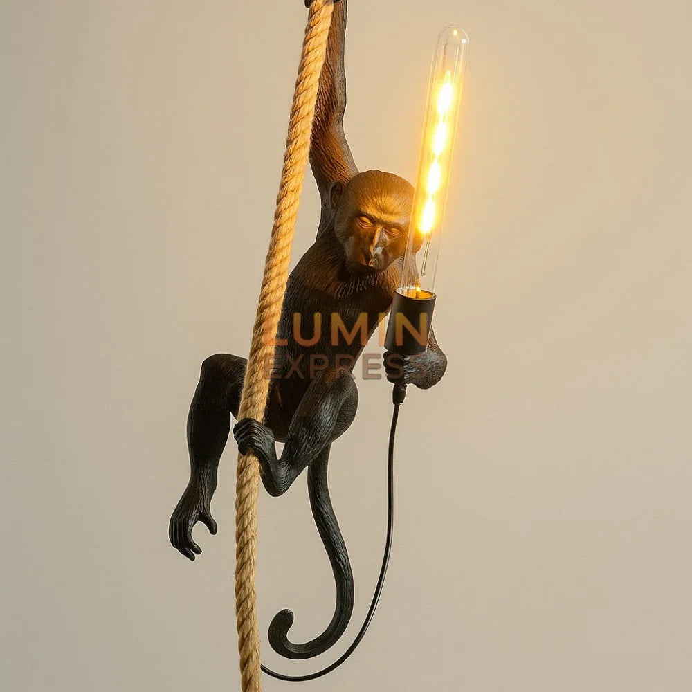 Singe lumineux en résine noire – suspension architectural Maroc